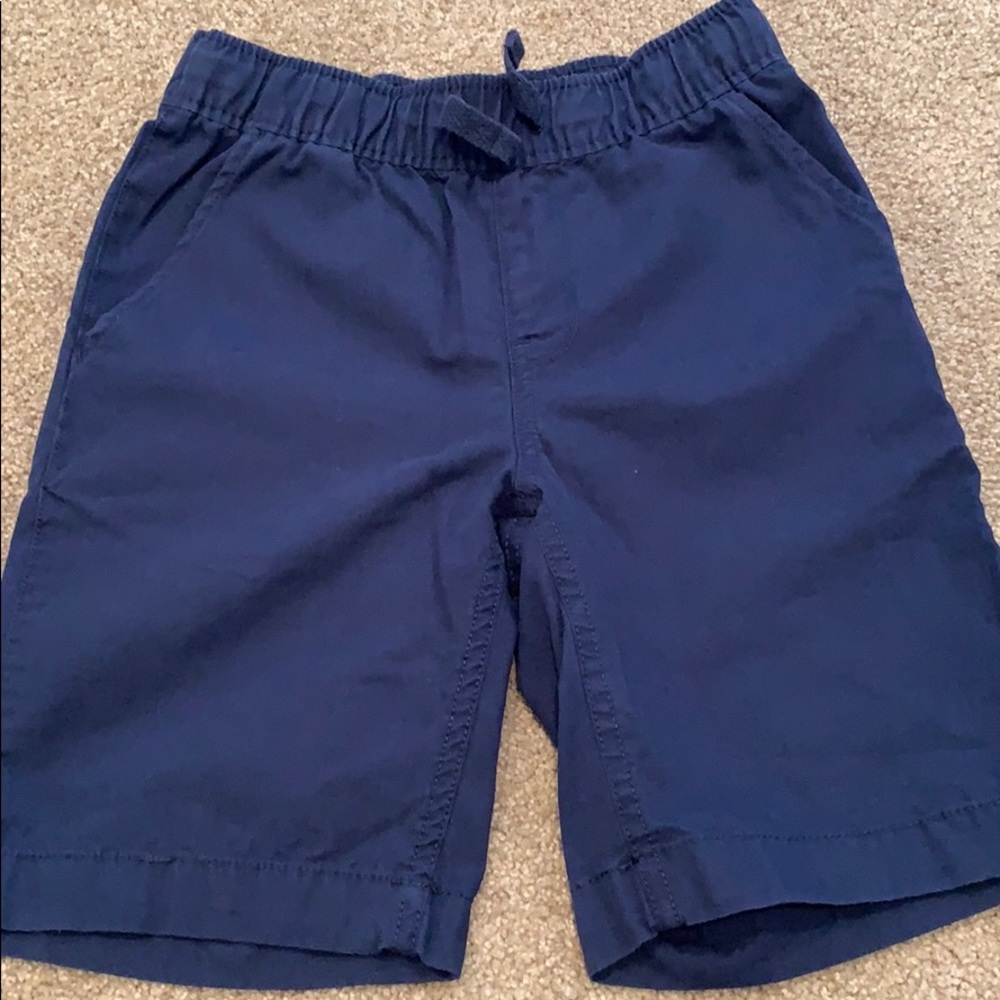 Boys pull on shorts